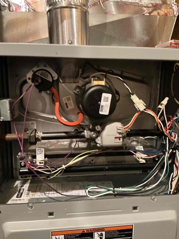 Completed scheduled heating maintenance tune-up on Comfort Aire furnace system with no reported operational issues. Performed comprehensive system inspection, verified all components operational, and relocated wiring junction box inside furnace cabinet while properly wiring ground connection per safety standards. Conducted combustion analysis and system diagnostics to ensure optimal performance for the heating season.