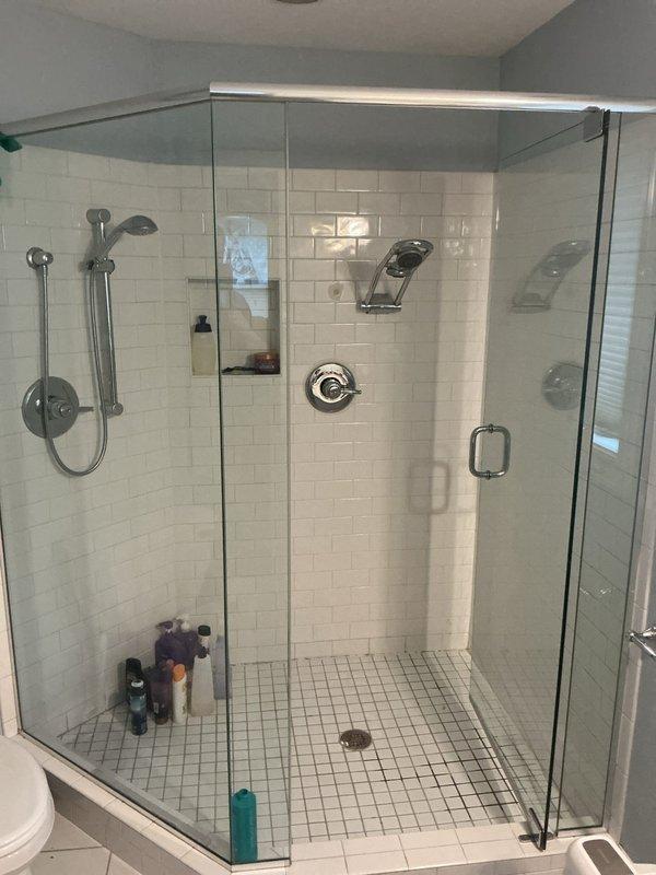 Returned to property to install customer-purchased shower fixtures including valve, trim, and multiple showerheads. Upon assessment, determined that the selected rain head products were not suitable for the application. Advised customer to return the incompatible fixtures and select alternative shower heads that would provide proper functionality and performance for the dual shower system installation.