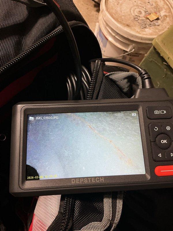 Performed furnace maintenance on a natural gas heating system over 25 years old. During inspection, discovered a cracked heat exchanger using video inspection equipment. Replaced air filter and documented findings with photographic evidence. Due to safety concerns with the cracked heat exchanger, recommended immediate replacement and coordinated with comfort advisor for system replacement options.