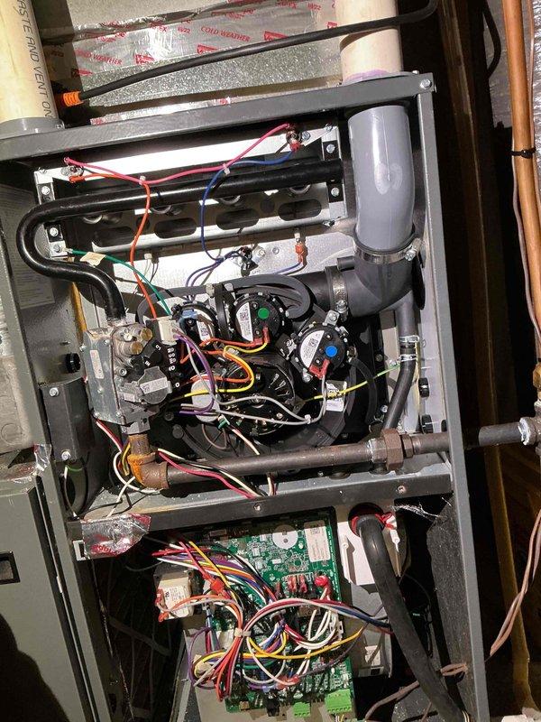Completed comprehensive maintenance tune-up on 4-year-old Amana furnace under membership agreement. Performed full system inspection including cleaning flame rod, verifying HSI ohms and inducer motor amperage within manufacturer specifications, and confirming ECM blower motor amp draw operating correctly. Removed, brushed, and thoroughly washed burner assembly to ensure optimal combustion efficiency. Inspected heat exchanger, noting minor surface rust but confirmed no cracks or structural compromise present. All electrical components, control board connections, and safety devices tested and verified operational. Unit heating properly upon completion with all systems functioning to specifications.