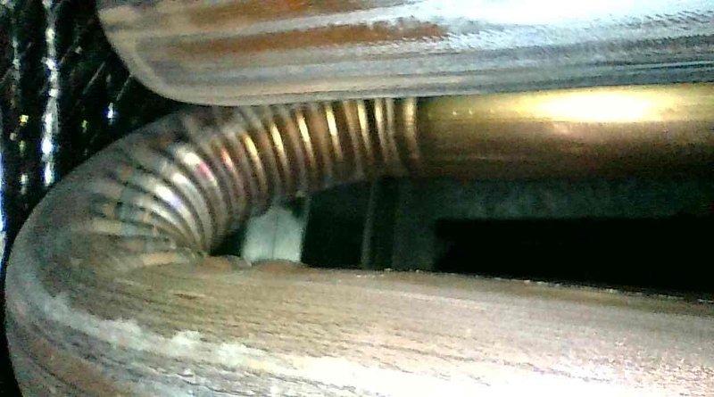 Completed comprehensive maintenance tune-up on 4-year-old Amana furnace under membership agreement. Performed full system inspection including cleaning flame rod, verifying HSI ohms and inducer motor amperage within manufacturer specifications, and confirming ECM blower motor amp draw operating correctly. Removed, brushed, and thoroughly washed burner assembly to ensure optimal combustion efficiency. Inspected heat exchanger, noting minor surface rust but confirmed no cracks or structural compromise present. All electrical components, control board connections, and safety devices tested and verified operational. Unit heating properly upon completion with all systems functioning to specifications.