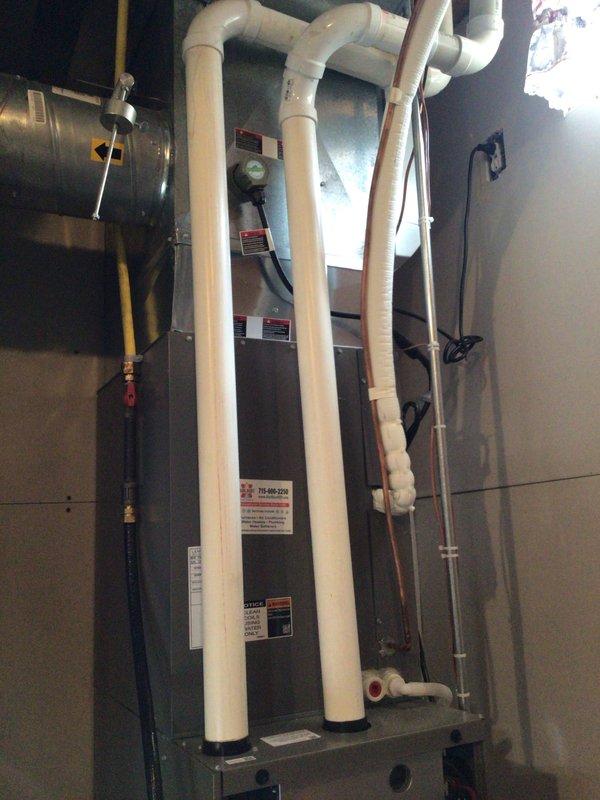 Completed comprehensive furnace tuneup on 5-year-old unit. Cleaned flame sensor, performed electrical testing with all readings within manufacturer specifications, replaced air filter with customer-provided unit, and conducted camera inspection of heat exchanger confirming no cracks or deterioration. Unit operating properly at time of service completion.