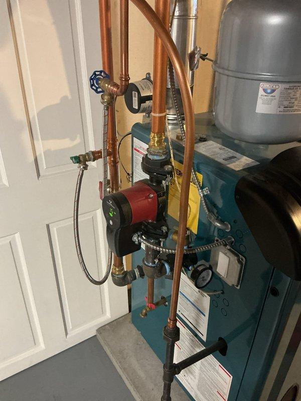 Completed annual preventative maintenance heating visit on residential boiler system and two gas fireplaces. Performed comprehensive tune-up on three-year-old boiler unit, inspecting all major components including expansion tank, circulator pump, water pressure and temperature controls. Conducted combustion analysis with CO testing in flue, confirming safe operating levels. All components tested within manufacturer specifications. Adjusted gas pressure from 3.6" wc to 3.5" wc for optimal performance. Verified proper operation of expansion tank and circulator pump. System is fully operational with all safety parameters met.