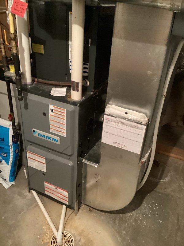 Performed scheduled heating maintenance on Daikin furnace system. During routine tune-up procedures, discovered critically elevated carbon monoxide levels measuring 1500 ppm at the flue. Adjusted gas pressure to reduce CO output to 500 ppm, though readings remain above acceptable safety thresholds. Encountered equipment complications with combustion analyzer experiencing power issues and potential calibration concerns. Inspection camera malfunctioned, preventing thorough heat exchanger examination. Due to safety concerns regarding elevated CO levels and equipment limitations preventing complete diagnostic assessment, scheduled return visit with backup analyzer and functional inspection camera to verify readings and conduct comprehensive heat exchanger inspection. Also performed visual inspection of Rheem water heater as requested. System requires follow-up service to ensure safe operation and proper combustion before clearance for continued use.