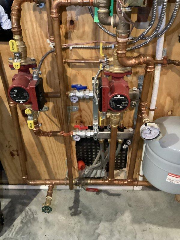 Completed preventive maintenance tune-up on two furnaces and one condensing boiler, all approximately seven years old. Addressed LOC 5 lockout code on condensing boiler by tracing wiring to purple and yellow wire connections, reseated loose wire connections, and successfully restored boiler operation with proper heating function. All equipment inspected and operating within normal parameters.