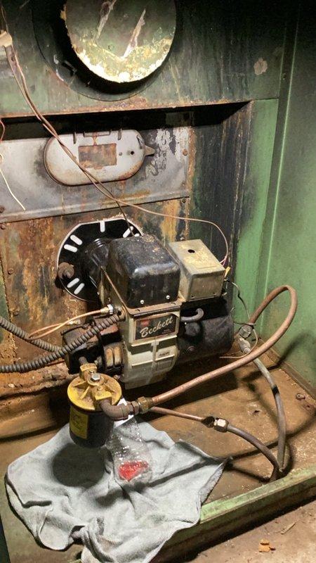 Responded to no-heat call on oil furnace with Beckett burner that failed to ignite. Inspected burner assembly, checked filter, and cycled unit to purge air from fuel line. Determined system is low on fuel oil despite gauge reading and recent delivery. Recommended homeowner contact fuel oil company to refill tank and verify delivery accuracy.