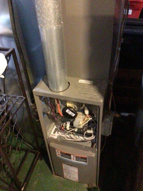 Completed scheduled heating maintenance on a 5-year-old Lennox furnace system. Performed comprehensive tune-up including flame sensor cleaning, full electrical testing with all readings within manufacturer specifications, and camera inspection of heat exchanger confirming good condition. Unit operating properly with brand new filter already in place at time of service.