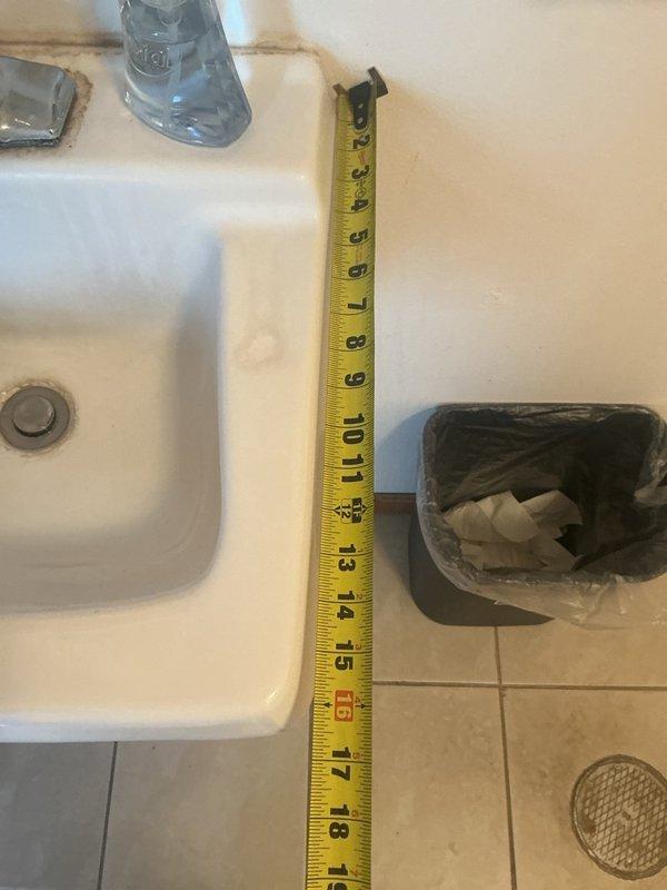 Responded to kitchen faucet leak and conducted thorough assessment of existing sink and faucet assembly. Documented precise measurements of current fixture dimensions and identified water damage on surrounding wall surfaces indicating prolonged moisture exposure. Provided detailed estimates for complete sink and faucet replacement to address the leaking issue and prevent further water damage to cabinetry and walls.