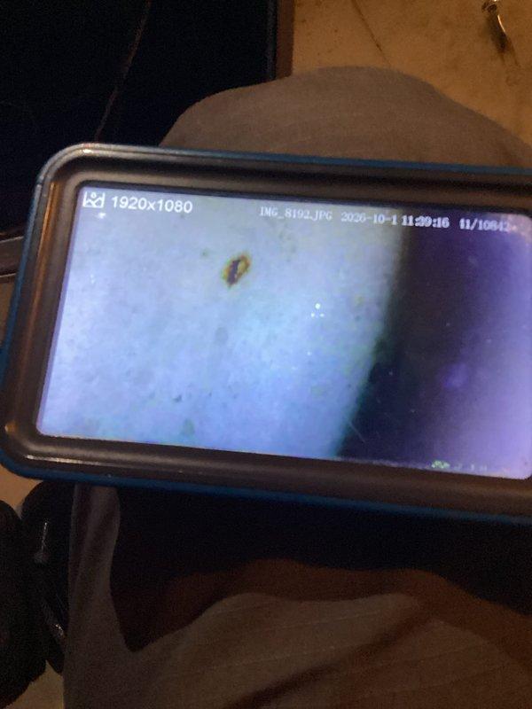Performed annual heating and cooling maintenance visit on one furnace, one air conditioning unit, two gas fireplaces, and replaced one 20x25x4 media air cleaner filter. During furnace inspection, thermal imaging revealed a hole in the heat exchanger, requiring furnace replacement for safety. Documented findings with thermal camera showing heat exchanger breach.