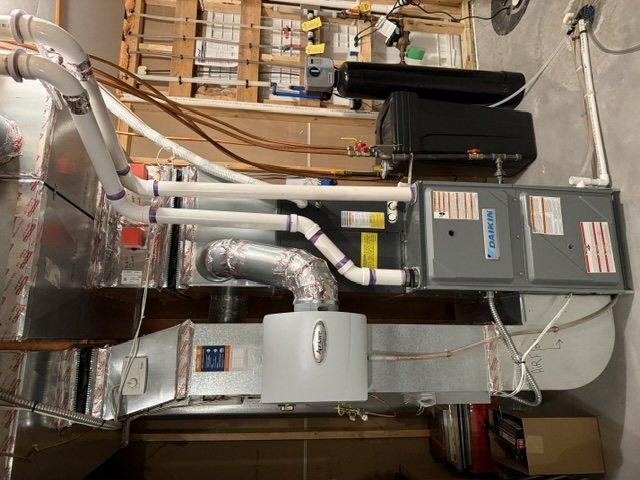 Completed comprehensive furnace tune-up on 6-year-old dual zone system. Found gas pressure elevated at 3.9" wc causing unit to burn excessively hot; adjusted down to manufacturer specification of 3.4" wc. Verified all components operating within specifications, confirmed safe CO levels in flue, tested humidifier operation with recently changed water panel, and inspected both zone dampers and motors for proper function. System restored to full operational status.