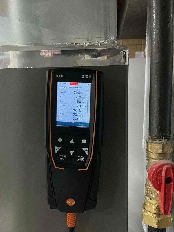 Completed comprehensive tune-up on 2-year-old Lennox heat pump system with gas furnace backup. Cleaned flame rod and verified hot surface ignitor ohms within manufacturer specifications. Measured inducer motor amperage and confirmed proper operation. Tested all heating stages including heat pump mode, stage 1 gas heat, and stage 2 gas heat operation through S30 thermostat. Conducted combustion analysis with readings showing carbon monoxide at 50 ppm. All system components functioning properly and heating effectively. Noted outdoor coil fins require cleaning for optimal air conditioning performance when needed for cooling season.