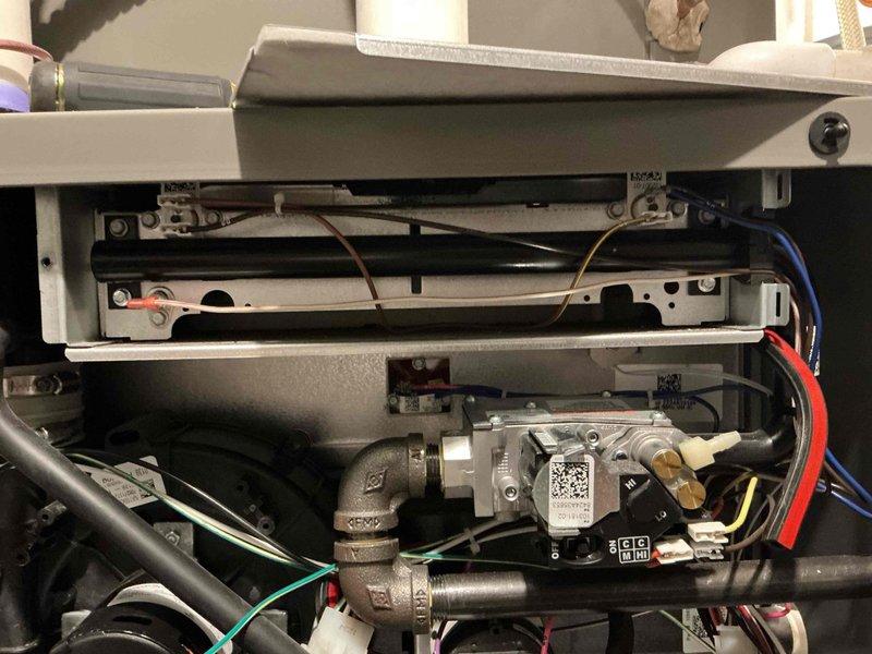 Replaced defective burner assembly on a 2-year-old furnace unit under parts and labor warranty coverage. Removed front access panel, disconnected gas line and electrical connections, and installed new burner assembly. Conducted thorough safety inspection including gas leak test at all connections and verified proper ignition sequence and burner operation before restoring unit to service.