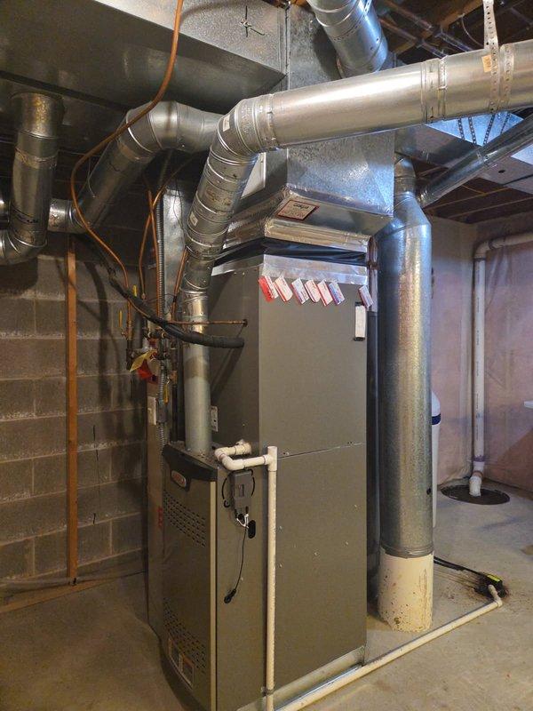 Completed comprehensive tune-up on 27-year-old forced air furnace with attached vanEE heat recovery ventilator system. Replaced dirty air filter with 20x25x2 filter, performed full system inspection and maintenance procedures on both furnace and HRV unit. Customer advised on filter specifications for future replacement needs.