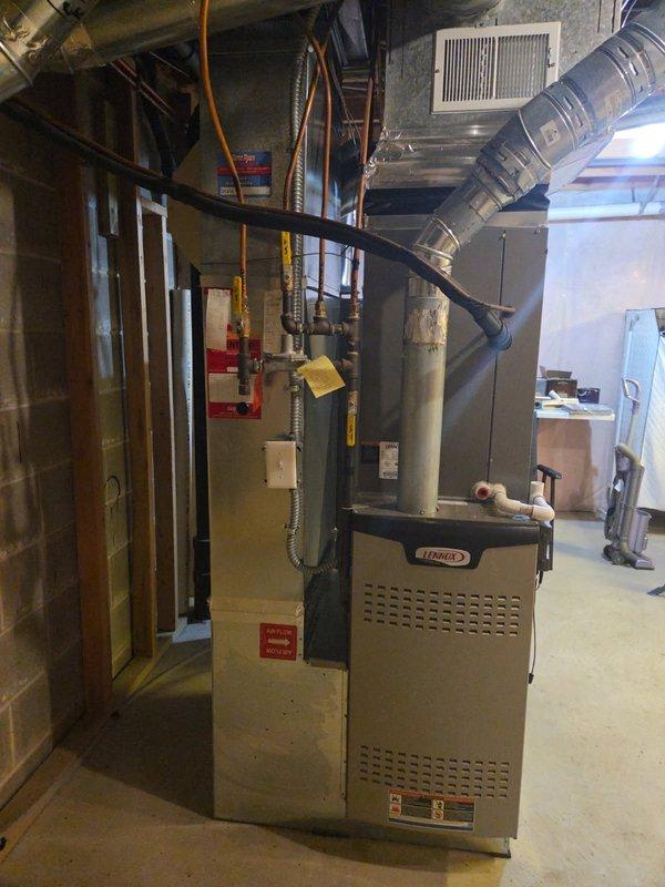 Completed comprehensive tune-up on 27-year-old forced air furnace with attached vanEE heat recovery ventilator system. Replaced dirty air filter with 20x25x2 filter, performed full system inspection and maintenance procedures on both furnace and HRV unit. Customer advised on filter specifications for future replacement needs.