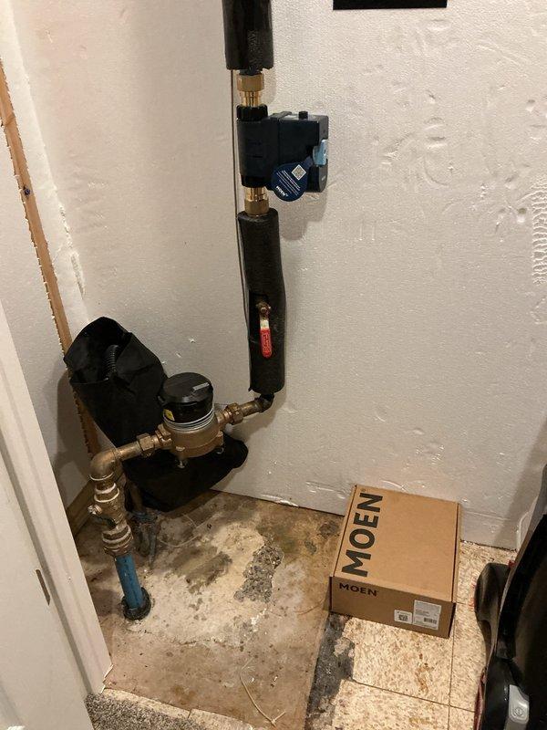 Responded to service call for multiple plumbing concerns including water heater maintenance, leak investigation, and water system upgrades. Performed complete flush and inspection of tanked water heater to address reported leak and ensure optimal performance. Evaluated exterior building leak to determine source and extent of water intrusion. Conducted thorough inspection of existing Water Doctors water softener system with digital control head, verifying proper operation of softener tank, brine tank, and control settings before extended property vacancy period. Successfully installed Moen Flo smart water detection and automatic shut-off valve system on main water line, integrating leak detection technology with existing plumbing infrastructure to provide whole-house water monitoring and emergency shut-off capability. Installation included mounting control unit, connecting to water supply line, and configuring system for remote monitoring. All plumbing connections tested and verified le