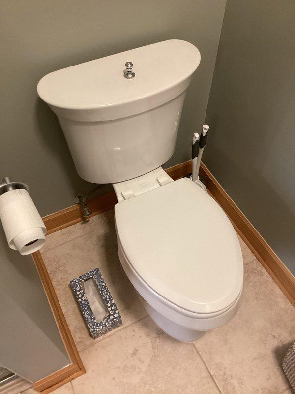 Responded to service call for multiple malfunctioning Kohler toilets. Adjusted flush linkage on basement toilet where chain length was insufficient for proper operation. Replaced master bathroom toilet per customer request. Both units tested and confirmed operational upon completion.