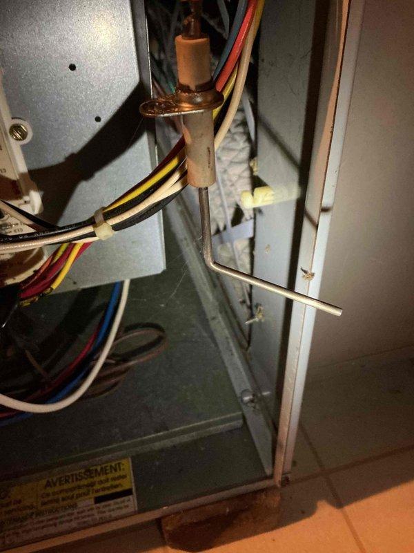 Performed annual maintenance inspection on 24-year-old Bryant furnace. Verified ignition system, flame safety controls, gas valve operation, and electrical amp draws within specifications. Replaced air filter, inspected control board, blower wheel, and motor assembly. Combustion analysis and temperature rise readings confirmed within acceptable range. Critical safety issue identified: heat exchanger crack detected at first dimple on left side near high limit switch, confirmed through tactile inspection. Discussed replacement options with homeowner due to safety hazard. Performed immediate safety shutdown of unit to prevent carbon monoxide exposure and scheduled follow-up consultation for system replacement.