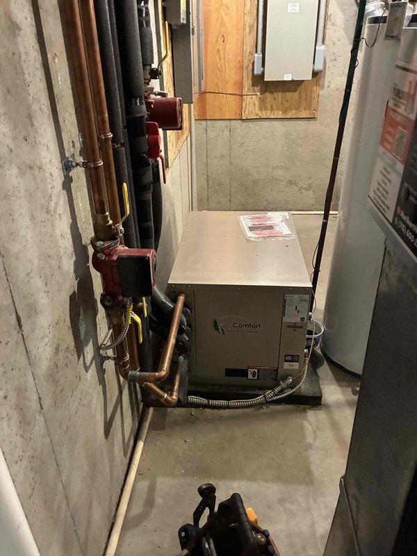 Completed comprehensive preventative maintenance on multiple systems including two geothermal units, backup gas furnace, and Generac standby generator. Performed thorough inspection of both geothermal systems with all operational data documented in photos. Replaced weak capacitor on water-to-water geothermal unit. Package geothermal unit inspected and found operating within manufacturer specifications with proper heating output.

Serviced newer backup forced air gas furnace including cleaning and inspection of routine components. All measurements verified within specification range and unit heating properly. 

Performed complete maintenance kit service on Generac residential standby generator including oil change, oil filter replacement, air filter replacement, and spark plug replacement. Battery tested and confirmed outputting proper 12 volts. Generator operating correctly with no issues identified. Exercise cycle previously adjusted from biweekly to weekly schedule, which has resulte