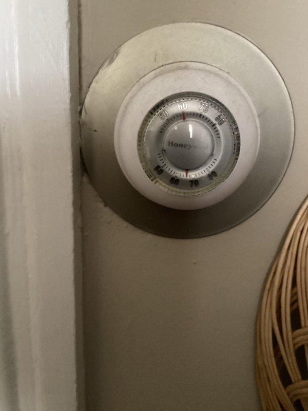 Completed annual boiler maintenance at rental property, performing ambient temperature readings on exterior of boiler unit and inspecting mechanical thermostat for proper operation. Cleaned heat exchanger surfaces and resealed connections to ensure efficient operation and prevent potential leaks. System checked and left in proper working condition.
