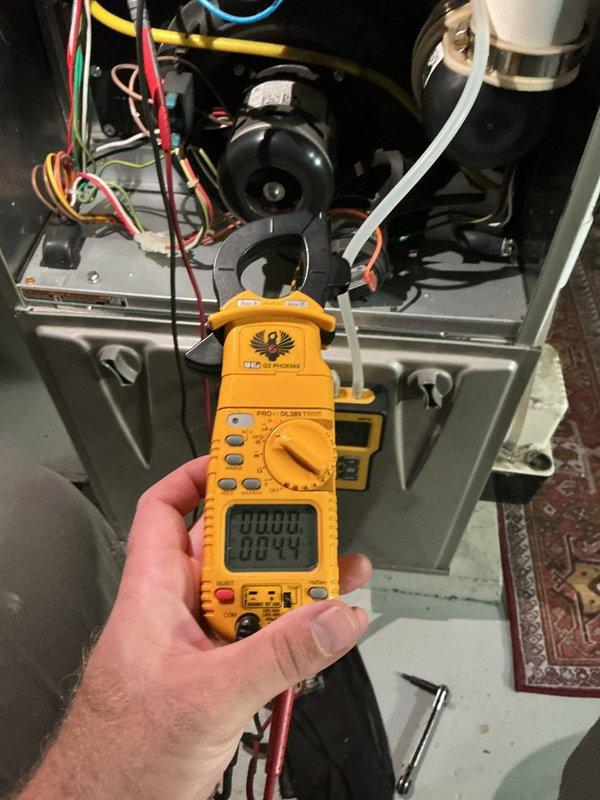 Completed comprehensive furnace tune-up on 10-year-old unit. Performed full system diagnostics including electrical measurements, gas pressure testing, and combustion analysis. All components tested within manufacturer specifications with safe CO levels confirmed in the flue. Heat exchanger inspection revealed minor temperature stress but no cracks or secondary leakage detected. System confirmed fully operational. Evaluated existing air cleaner and provided information regarding whole home HEPA filter upgrade options.