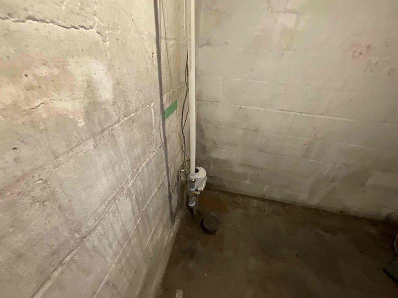 Responded to first call priority service window for vacant property requiring multiple plumbing installations. Assessed existing plumbing infrastructure in lower level utility area, noting aged copper piping and deteriorated conditions throughout unfinished basement space. Documented pre-existing conditions including exposed concrete block walls, compromised paint surfaces, and aging mechanical systems requiring attention prior to installation work. Coordinated arrival time with property owner and confirmed scope of work including main floor toilet and pedestal sink installation, shower faucet replacement, dishwasher hookup preparation, and exterior lower level spigot installation. Photographic documentation completed showing existing plumbing conditions and workspace layout to establish baseline for renovation project proceeding in conjunction with scheduled electrical contractor work.