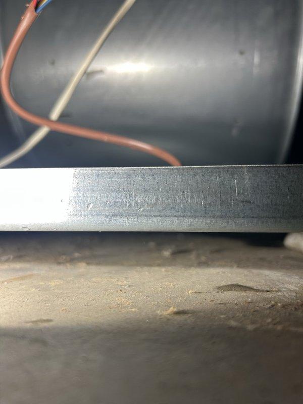 Responded to service call for 8-12 furnace leaking water onto floor from condensate drain system. Upon inspection, found improperly wrapped insulation causing condensation buildup and plugged condensate trap on two-year-old unit. Cleared condensate trap, properly insulated furnace corners and edges with tape, and advised that air filter requires replacement.