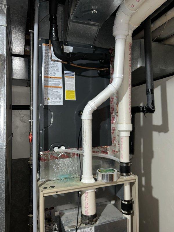 Responded to no heat call and diagnosed thermostat wiring issue. Found green thermostat wire incorrectly landed on G terminal for indoor fan operation following previous AC replacement, preventing proper heating system and wood burner operation. Re-terminated green wire to W terminal per existing control strategy, restoring correct heating function. Verified proper system operation and advised that while green wire is conventionally used for G terminal, the revised wiring configuration matches the home's established control setup and resolves the heating issue.