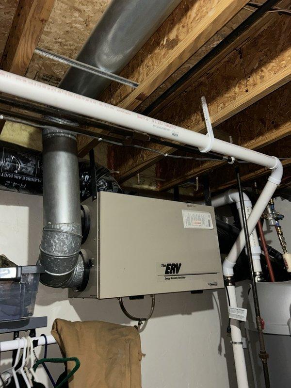 Responded to no heat call and diagnosed thermostat wiring issue. Found green thermostat wire incorrectly landed on G terminal for indoor fan operation following previous AC replacement, preventing proper heating system and wood burner operation. Re-terminated green wire to W terminal per existing control strategy, restoring correct heating function. Verified proper system operation and advised that while green wire is conventionally used for G terminal, the revised wiring configuration matches the home's established control setup and resolves the heating issue.