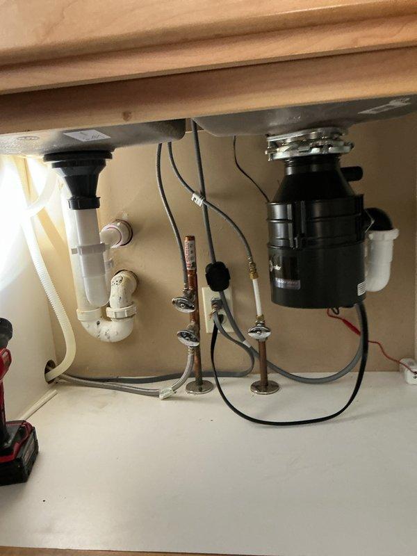 Successfully installed customer-supplied kitchen faucet and reconnected kitchen drain assembly beneath sink. Additionally, replaced cartridges in master bathroom faucet under a separate home warranty work order, utilizing Delta genuine replacement parts (RP25513-3). All plumbing connections tested and verified leak-free upon completion.