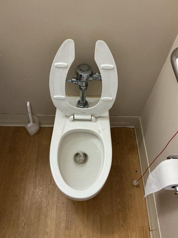 Responded to a clogged toilet that would not flush properly due to excessive foreign materials in the drain line. Utilized a drain auger for approximately 10 minutes to clear the obstruction, successfully removing toilet paper, wipes, and other debris from the waste line. Restored proper flushing function to the fixture.