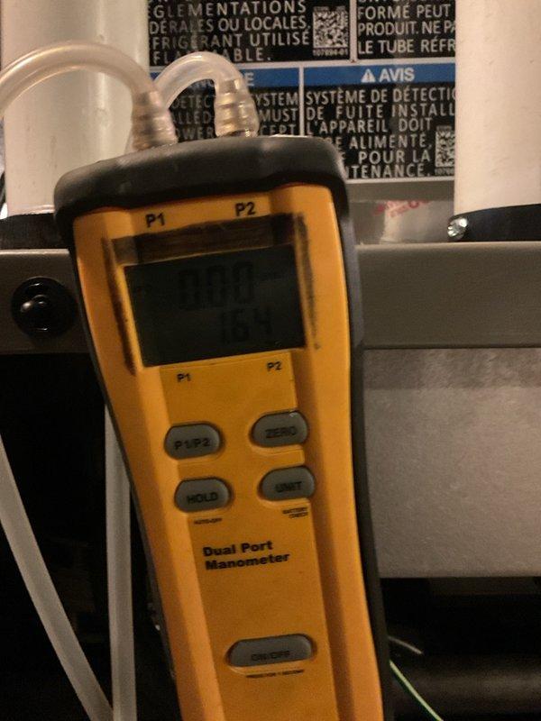 Completed full HVAC system upgrade by removing existing 80% efficiency furnace and installing new EL297V 97% AFUE two-stage variable speed upflow furnace rated at 70,000 BTU. Added complete air conditioning system including EL15KC1 15.9 SEER2 single-stage 2.5 ton outdoor condenser unit and 3-ton B-frame cased evaporator coil with factory-installed TXV valve. Upgraded to high-efficiency 90% furnace requiring new PVC venting installation to meet condensing furnace requirements. Coordinated with electrician for installation of new dedicated electrical circuit to support upgraded equipment. Installed new outdoor concrete pad, disconnect box, and electrical whip for condenser unit. Mounted outdoor unit on pad against building exterior with proper refrigerant line connections using insulated line set. Performed system commissioning including pressure testing with dual-port manometer to verify proper refrigerant charge and airflow. All equipment installed per manufacturer specifications and l