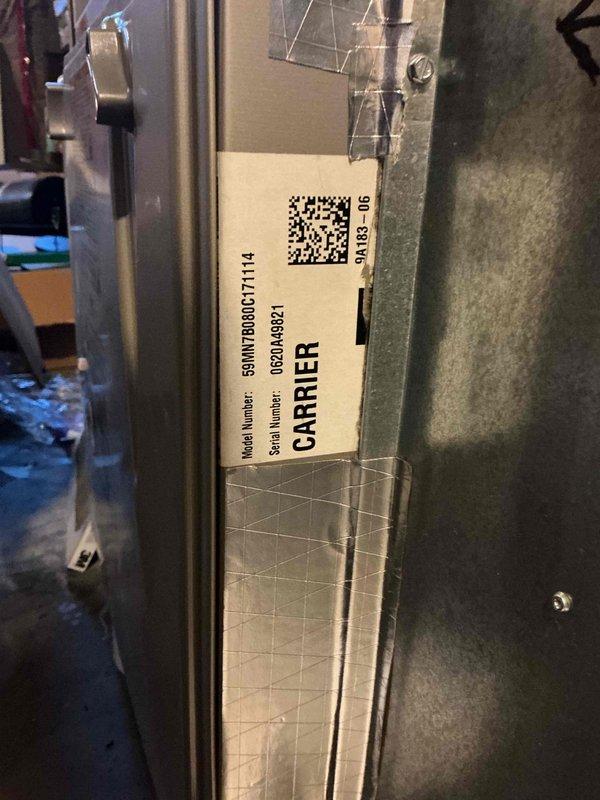Responded to no-heat call on Carrier furnace (Model 99MVN7080G171114) following recent control board replacement. Unit displayed inducer start fault code upon arrival. Removed and inspected inducer motor assembly, discovering the blower wheel was jammed with debris including rocks that had entered the system. Cleared obstruction and verified free rotation of inducer wheel. Cleaned burner assembly which showed moderate dirt accumulation. Reassembled unit and performed operational test, confirming proper ignition sequence and heat output. System restored to normal operation.