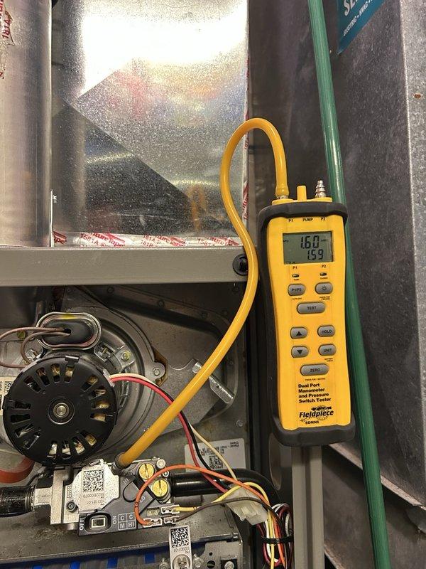 Completed annual heating maintenance visit including comprehensive furnace tune-up and gas fireplace inspection. Cleaned flame sensor, inspected blower wheel, air filtration system, inducer motor, gas valve, and heat exchanger with no defects found. Verified combustion efficiency at 80.0%, confirmed safe carbon monoxide levels, tested gas pressure, cleaned burners, and removed debris and web buildup. Corrected air filter orientation to ensure proper airflow direction toward furnace and recommended filter replacement every 2-3 months for optimal system performance.