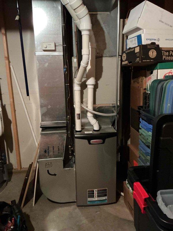 Completed comprehensive furnace tune-up on 3-year-old unit under maintenance agreement. Performed full system inspection including cleaning flame sensor, verifying condensate drain operation, inspecting all electrical components and connections, checking burners, replacing air filter, and cleaning blower wheel. Upon startup, measured and slightly adjusted gas pressure to optimize performance, confirmed proper operation with 60° temperature rise across heat exchanger, and verified all systems functioning within manufacturer specifications.