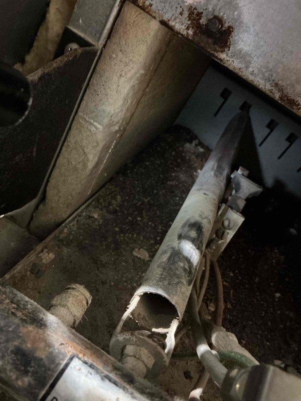 Performed comprehensive tune-up and inspection on 47-year-old Burnham Series 2 boiler model P204-WI. Inspected all piping and found no leaks with proper system pressure maintained. Verified circulator pump operation and pressure relief valve functionality. Pulled burners and thoroughly cleaned combustion chamber. Inspected heat exchanger with satisfactory condition noted. Conducted combustion analysis with acceptable readings; detected minor carbon monoxide seepage from seals measuring 2 ppm, which remains within safe operating parameters and does not require immediate shutdown. All other boiler components operating within normal specifications at time of service. Homeowner inquired about future basement piping reconfiguration options for finishing project but elected to defer consultation until ready to proceed. Unit left in safe, operational condition with no immediate service recommendations required.