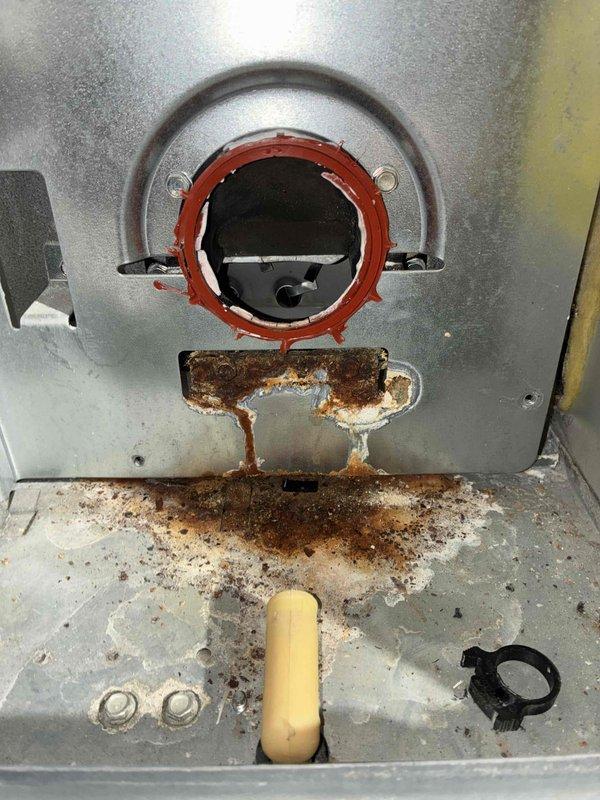 Responded to no heat call on 15-year-old furnace blowing cold air. Upon inspection, confirmed gas supply present but burners failing to ignite. Found burner assembly severely rusted and corroded, preventing proper gas flow through orifices. Inducer motor bearings exhibiting excessive wear and noise, indicating imminent failure. Discovered cracked inducer transition plate behind inducer assembly with active water leakage, causing significant corrosion damage to surrounding components and base pan. Extensive rust and mineral deposits observed throughout heat exchanger compartment. Documented conditions with photos showing deteriorated mounting bracket, corroded base panel, and compromised gasket seal. Due to age of unit and extent of multiple component failures, provided customer with repair estimate requiring new inducer motor assembly, complete burner replacement, and inducer transition plate. Completed parts order form and scheduled equipment advisor consultation to discuss furnace re