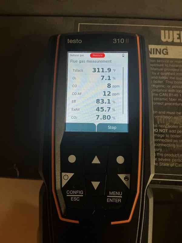 Performed comprehensive preventive maintenance on 3-year-old residential boiler system. Conducted full system inspection and verified all components operating within manufacturer specifications. Tested and confirmed proper gas pressure delivery to burner assembly. Performed combustion analysis using calibrated flue gas analyzer, measuring stack temperature at 311.9°F, oxygen levels at 7.1%, carbon monoxide at 8 ppm, and efficiency at 83.1%. Verified safe carbon monoxide levels in flue exhaust. Inspected and confirmed proper water pressure and expansion tank operation. Bled all radiators to remove trapped air and ensure optimal heat distribution throughout system. System is fully operational with all safety parameters within acceptable ranges.