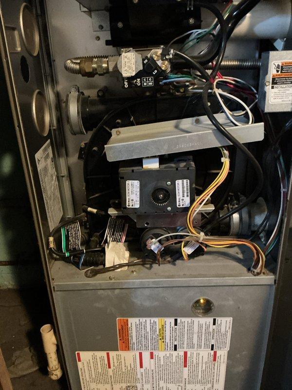 Responded to no heat call on 22-year-old furnace displaying error code. Performed diagnostic inspection and determined blower motor operational but heating system non-functional. Conducted safety inspection of heat exchanger which passed visual examination. Identified failed pressure switch as root cause preventing furnace ignition sequence. Discussed repair options with homeowner who elected to purchase replacement pressure switch and perform installation independently.