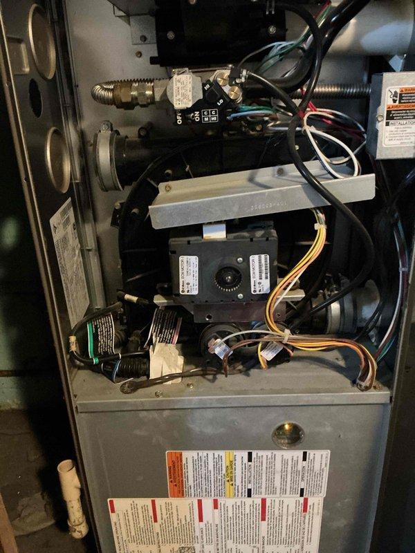 Responded to no heat call on 22-year-old furnace displaying error code. Performed diagnostic inspection and determined blower motor operational but heating system non-functional. Conducted safety inspection of heat exchanger which passed visual examination. Identified failed pressure switch as root cause preventing furnace ignition sequence. Discussed repair options with homeowner who elected to purchase replacement pressure switch and perform installation independently.