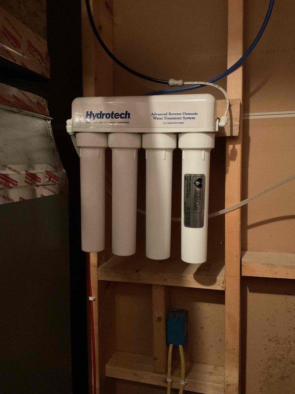 Serviced an 8-12 Hydrotech Advanced Reverse Osmosis Water Treatment System and successfully replaced a leaking needle valve. The two-year-old system was found to be operating properly following the repair, though filter replacement will be needed in the future due to the age of the unit.