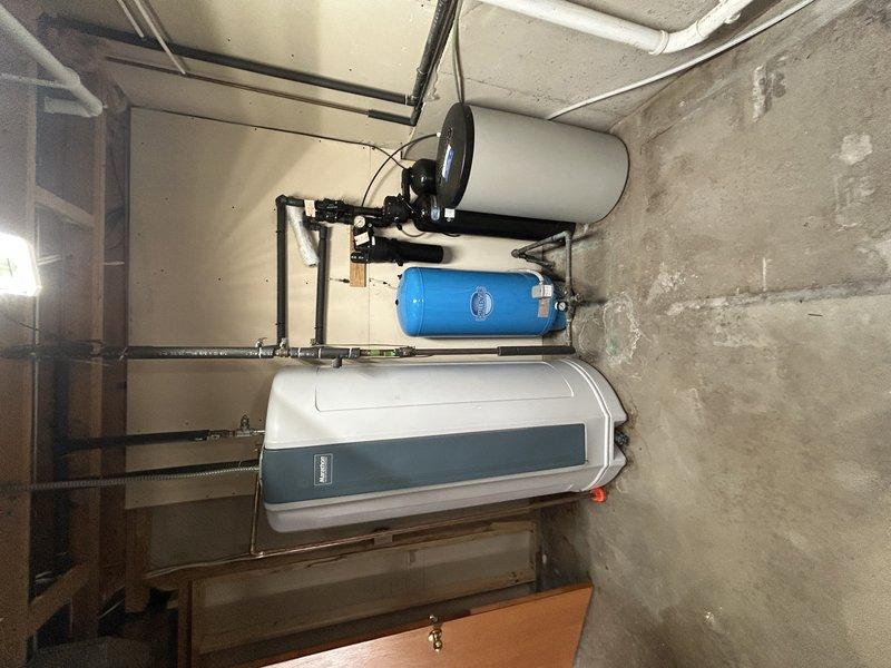 Completed scheduled heating maintenance on two Lennox furnace systems per membership agreement. Performed comprehensive tune-up on primary house furnace including operational testing, drain clearing, and temperature sensor inspection; noted air filter requires replacement. During inspection of secondary garage furnace, identified failed blower motor preventing unit operation. Procured and installed replacement blower motor under warranty, restoring full system functionality. Both heating systems tested and confirmed operating within normal parameters upon completion.