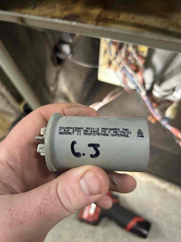 Performed fall maintenance on rooftop units and responded to reported rattling noise complaint. Upon inspection of furnace system, identified failing blower motor causing excessive vibration transmitted through floor and structure. Further diagnostic revealed compromised heat exchanger with visible eyelets present, creating unsafe operating condition. Unit was immediately tagged out of service per safety protocols. Documented findings with photographic evidence showing Heil furnace installation and internal components including capacitor. Provided customer with options for repair including heat exchanger and blower motor replacement versus complete equipment replacement, as property is not customer-owned requiring landlord approval for major expenditure decisions.