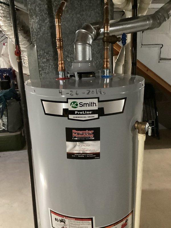 Responded to active water leak at duplex water treatment system. Upon inspection, identified leak originating from water softener drain port. Retightened drain port connection using channel locks until secure, successfully stopping the leak. Verified all connections were properly sealed and system was functioning normally before completing service.