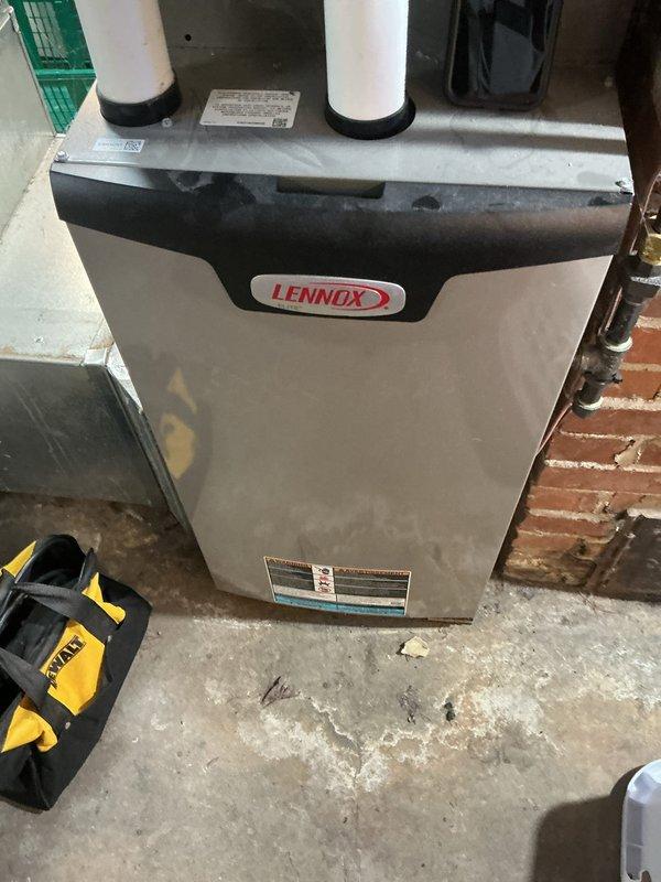 Completed comprehensive annual tune-up on 2-year-old Lennox heating and cooling system per maintenance agreement. Performed full inspection of indoor furnace unit and outdoor condenser unit, identifying dirty condenser coil that was restricting airflow and reducing system efficiency. Thoroughly cleaned condenser coil to restore optimal heat transfer and system performance. All components inspected and system operating within manufacturer specifications upon completion.