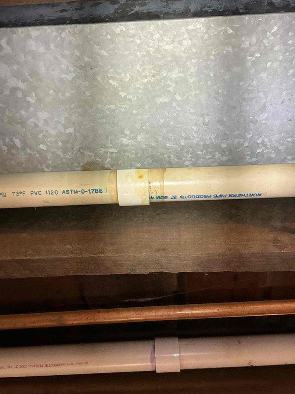 Responded to callback for water leaking through ceiling from furnace area. Upon inspection, identified the flue connection pipe in basement as source of dripping. The existing flue section is aged and was not replaced during previous furnace installation. Attempted repair but insufficient clearance prevented proper fix. Due to confined workspace constraints, full replacement of flue section by installation crew is required to properly resolve the leak issue.