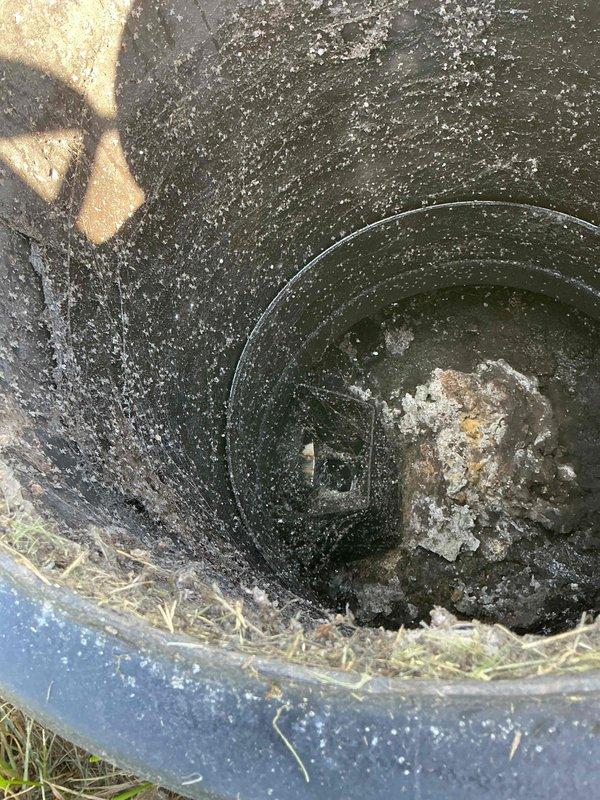 Responded to a duplex lower unit experiencing drainage issues with sink and tub backup accompanied by gurgling sounds. Upon arrival, verified the tenant's concerns and performed initial diagnostic assessment to determine the source of the blockage.

Conducted video camera inspection of the mainline drain system from the septic tank access point. Camera scope revealed a significant toilet paper blockage obstructing the drain line. The accumulation was causing complete restriction of wastewater flow, resulting in the reported backup and gurgling symptoms in the plumbing fixtures.

Utilized drain camera equipment to mechanically break up and remove the toilet paper blockage from the mainline. Carefully cleared the obstruction while monitoring progress through the camera feed to ensure complete removal of all debris. Once initial clearance was achieved, performed thorough flushing protocol to verify system functionality.

Ran water continuously for approximately 20 minutes through multiple