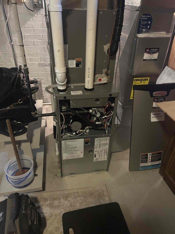 Completed scheduled front furnace tune-up and maintenance inspection on gas heating system. Performed comprehensive system evaluation including blower motor operation, electrical connections, burner assembly, and all safety controls. Inspected condensate drain line, ductwork connections, and verified proper venting. All components found operating within normal parameters with no deficiencies noted. System tested and confirmed functioning properly.