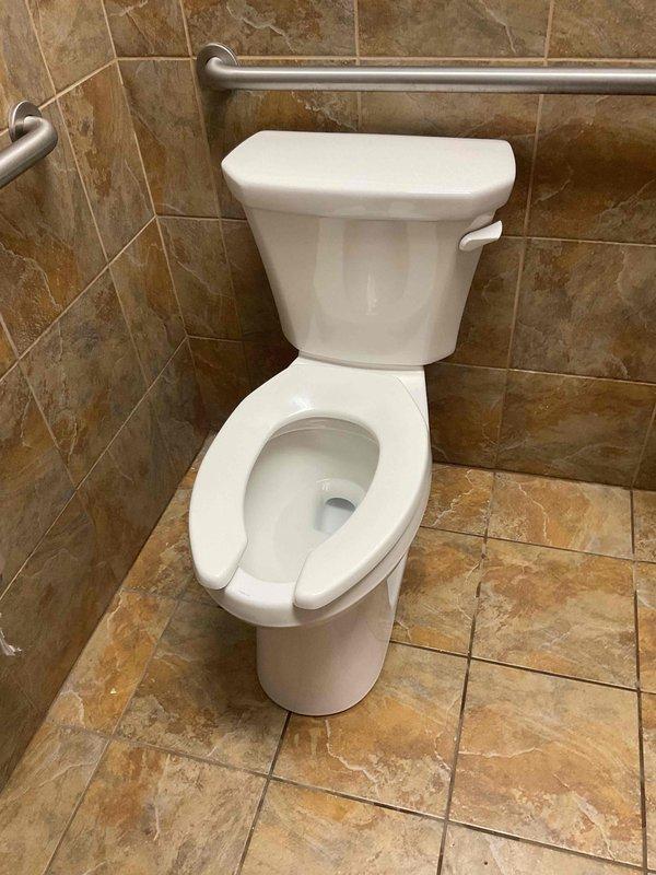 Sold and installed an ADA-compliant toilet upgrade featuring an elongated bowl design for enhanced comfort and accessibility. The new fixture utilizes water-efficient technology, consuming 50% less water than the previous unit while providing superior performance with chemically-treated water systems. Installation included a new wax ring seal and mounting bolts to ensure proper seating and leak prevention. The toilet features a sanitary bar design that prevents moisture accumulation beneath the tank. Picked up materials from First Supply in South St. Paul and consulted with the customer regarding toilet selection and performance specifications. The upgraded fixture meets ADA accessibility standards and is compatible with existing grab bar installations in the bathroom space.