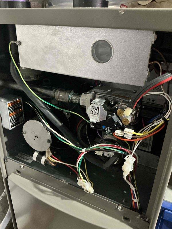 Completed annual furnace maintenance and tune-up on a 3-year-old Lennox heating system. Performed comprehensive inspection of all internal components including gas valve assembly, electrical connections, heat exchanger, and safety controls. Verified proper operation of burner assembly, ignition system, and flame sensor. Inspected all wire harnesses and connections for secure attachment and proper routing. System tested and confirmed operational with all components functioning within manufacturer specifications.