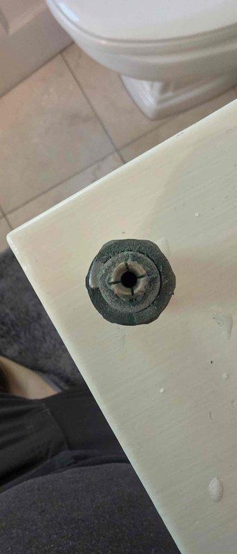 Responded to emergency call for active water leak causing flooding in residence. Located source of leak at bathtub fixture and identified failed cartridge as cause. Removed defective cartridge, installed replacement unit, and tested system to confirm leak was fully resolved and water flow restored to normal operation.